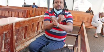 Kenyan activist Edwin Mutemi wa Kiama at the Milimani Law Courts in Nairobi on Wednesday, April 7, 2021. Kiama had been arrested for publishing infographics alleged to be ridiculing President Uhuru Kenyatta and joining the #IMFStopLoaningKenya conversation on Twitter. Photo credit: Edwin Mutemi wa Kiama