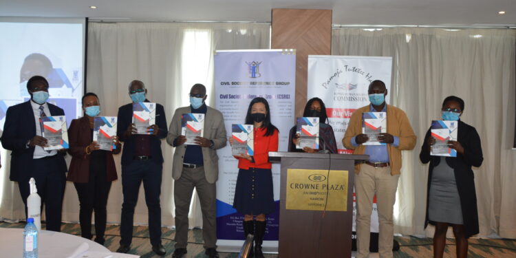 Kenya Human Rights Commission (KHRC) , Civil Society Reference Group (CSRG) and other CSO representatives during the launch of the 3 publications on Civic Space at Crowne Plaza Hotel. Photo Credit: KHRC/Moses Gowi