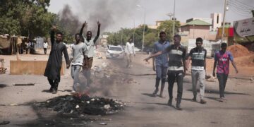 Youths burn tyres in Khartoum, Sudan, on Tuesday, October 26, 2021, during a protest to oppose a military takeover. Photo credit: @AP/Marwan Ali