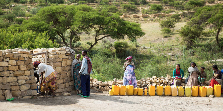 Families fetch water from a UNICEF supported well in Kilte Awlalo in the Tigray region of Ethiopia. Photo credit: UNICEF/Zerihum Sewunet