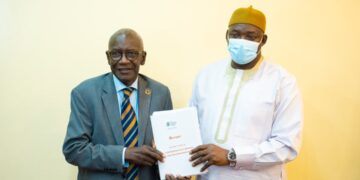 The Gambia President Adama Barrow receives the final Truth, Reconciliation and Reparation Commission, TRRC Report handed to him by the the TRRC Chairman, Dr. Lamin J Sise. Photo: TRRC Facebook