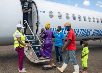 Refugees from Burundi prepare to board a flight back home in December 2020. © UNHCR/Samuel Otieno