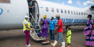 Refugees from Burundi prepare to board a flight back home in December 2020. © UNHCR/Samuel Otieno