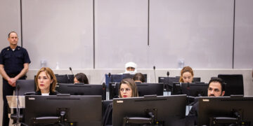 Far end: Al Hassan Ag Abdoul Aziz Ag Mohamed Ag Mahmoud and his lead counsel Melinda Taylor (far left) during the opening statement and presentation of evidence by the defence.