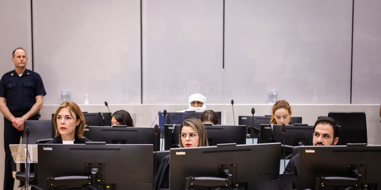 Far end: Al Hassan Ag Abdoul Aziz Ag Mohamed Ag Mahmoud and his lead counsel Melinda Taylor (far left) during the opening statement and presentation of evidence by the defence.