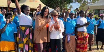 Minou Tavarez Mirabal, the Chairperson of the Board of the Trust Fund for Victims (TFV), and Judge Silvia Fernández de Gurmendi, the President of the Assembly of States Parties (ASP), pose for a photo with the beneficiaries of the TFV project in northern Uganda during the Joint Monitoring Visit in September, 2022. Photo credit: @Embassy of Ireland in The Netherlands, Twitter account